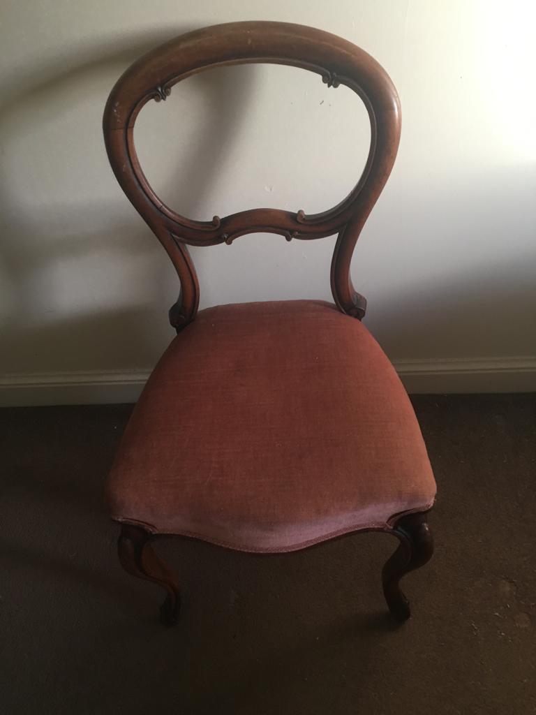 Large chairs with pink velvet cover.jpeg