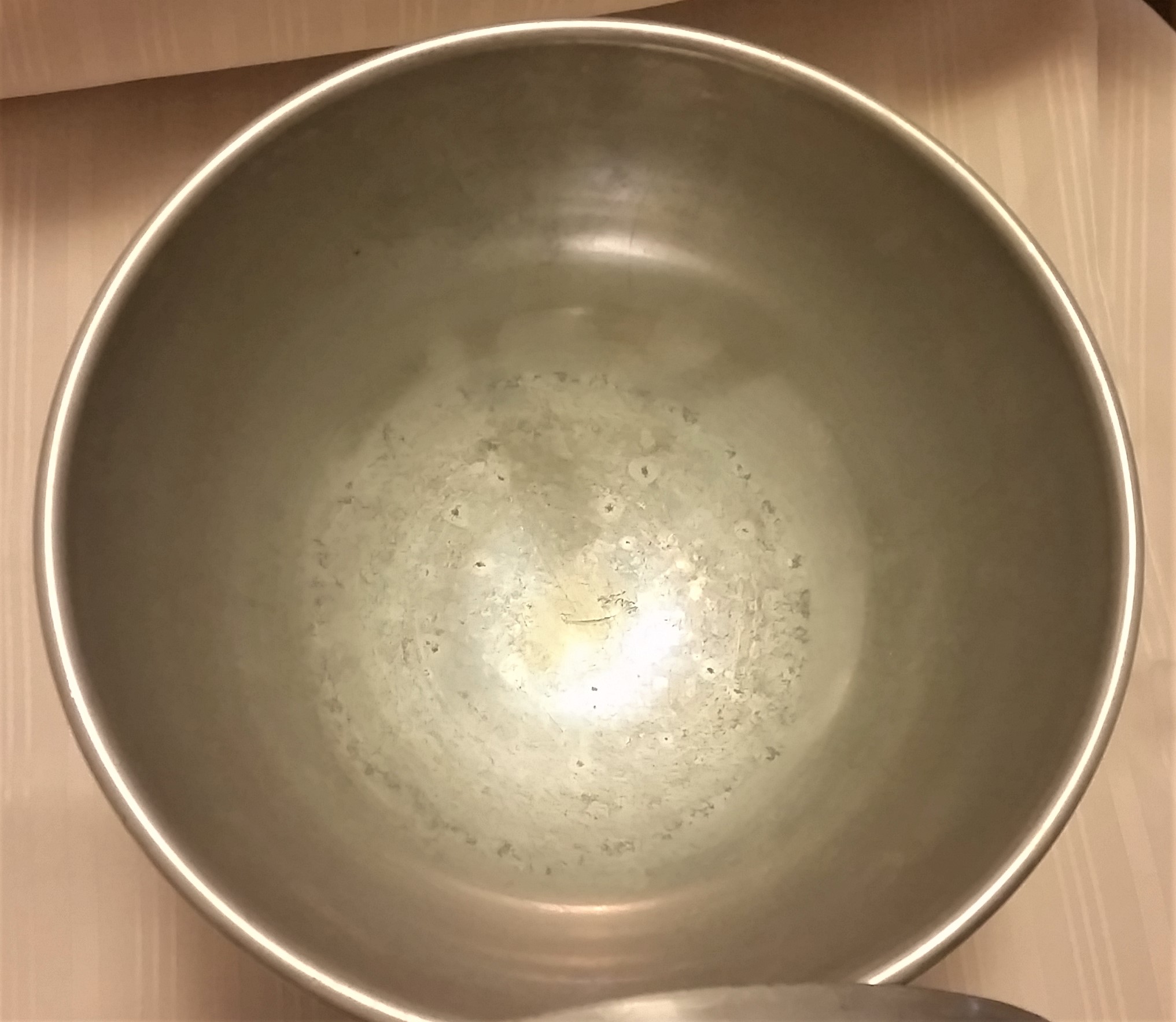large covered pewter style dish inside bowl.jpg