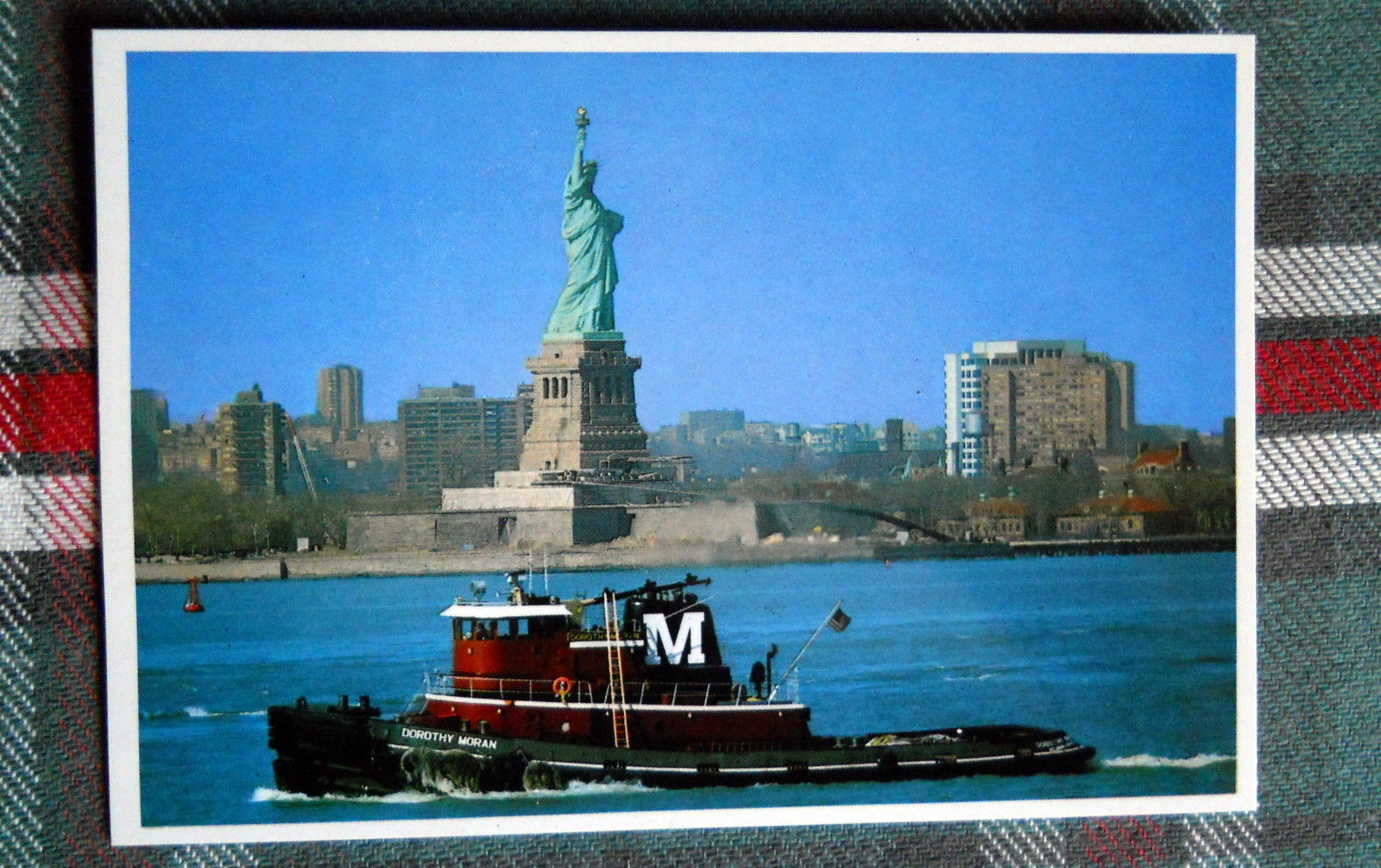 New York City STATUE OF LIBERTY with tugboat New Jersey background POSTCARD.jpg