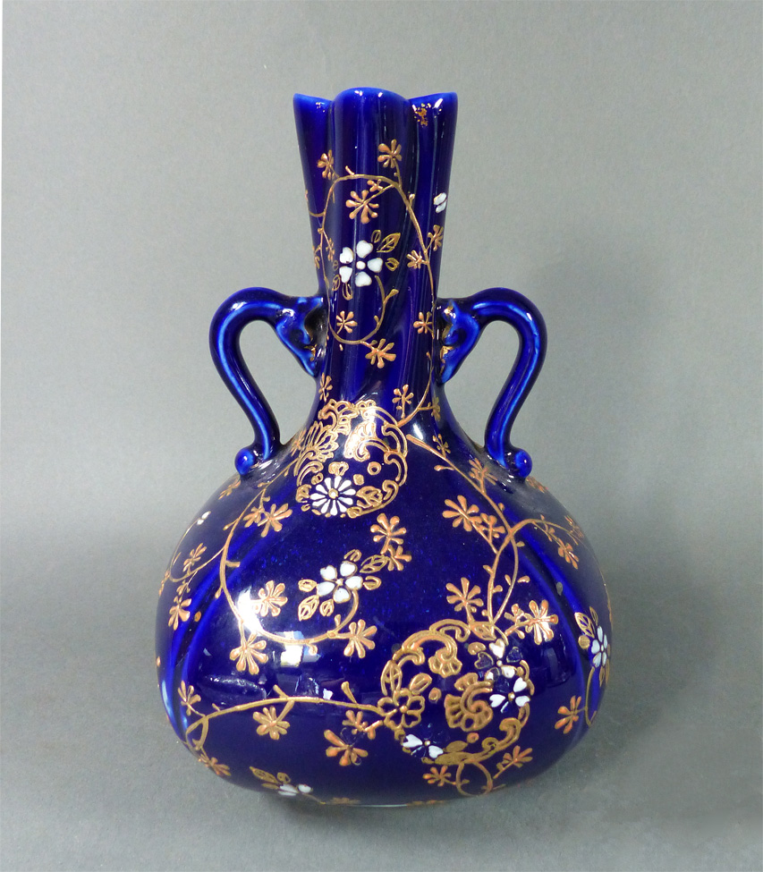 Cobalt blue porcelain vase with gold/enamel designs. Antiques Board