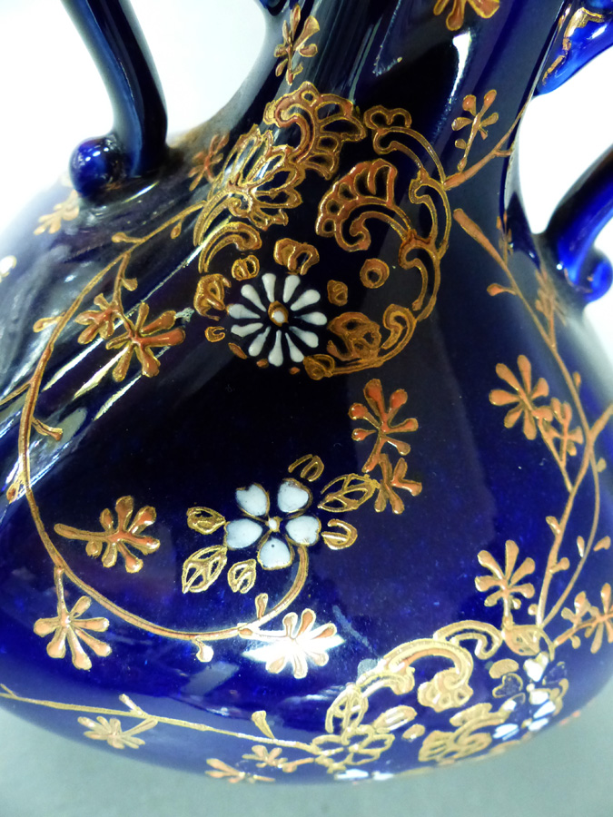 Cobalt blue porcelain vase with gold/enamel designs. Antiques Board