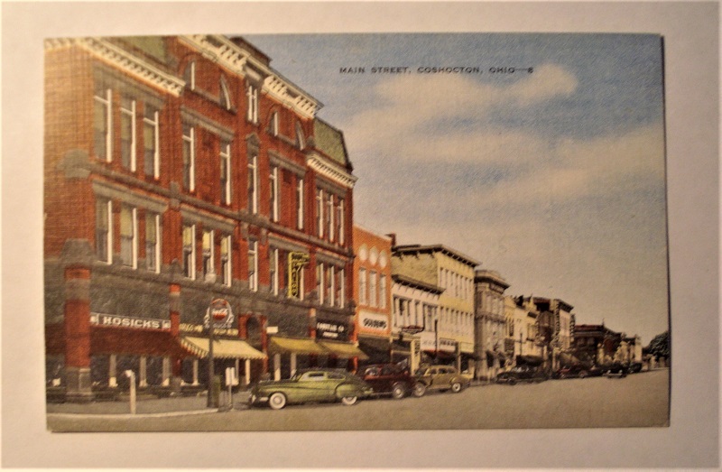 postcard coshocton ohio main street stores.jpg