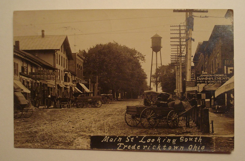 Cool Real Photo Postcard Fredericktown, Ohio Main Street Scene