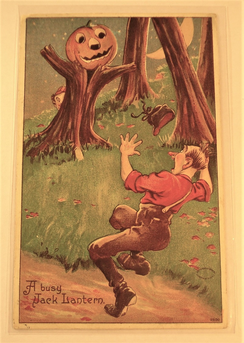 postcard halloween jackolantern scaring hat off man.jpg