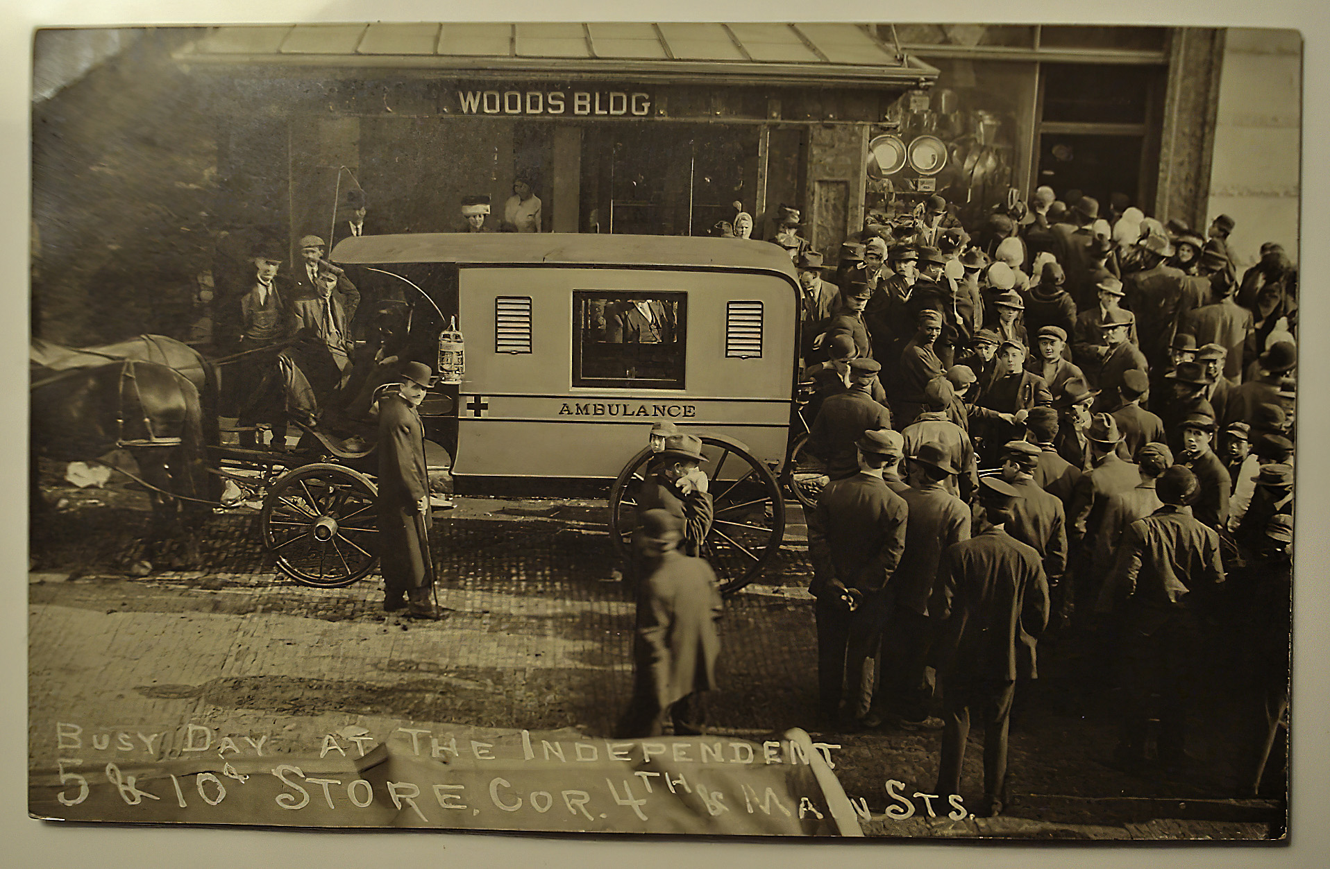postcard indiana ambulance crowd outside store-standard-scale-2_00x-gigapixel-X1.jpg