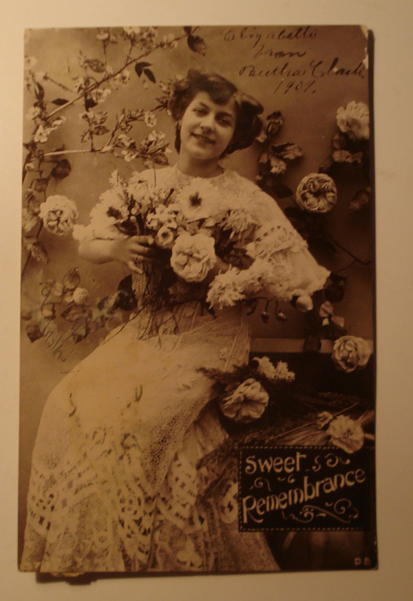 postcard pretty woman with flowers.jpg