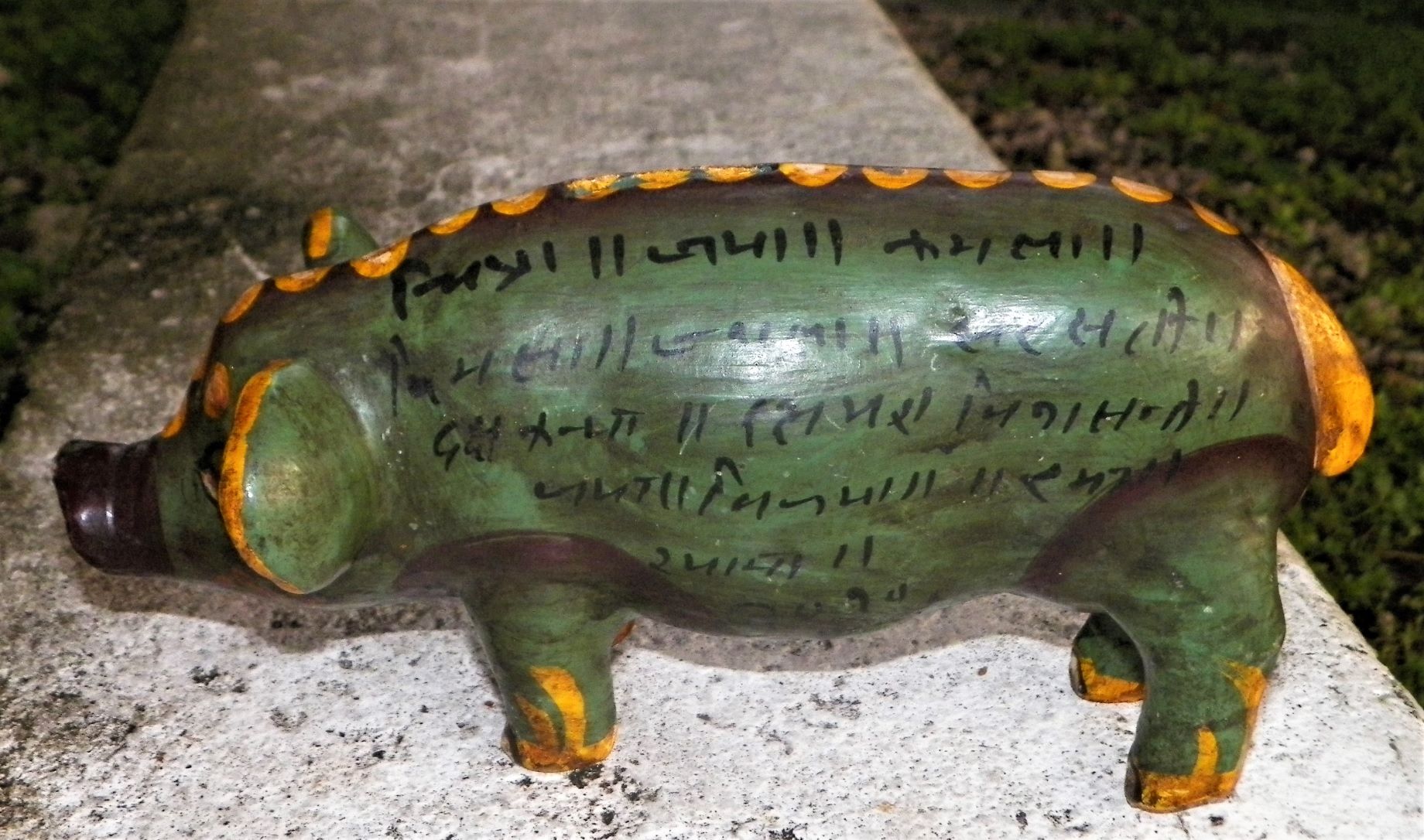 POTTERY PIGGY BANK WITH ARABIC WRITING 3AA.JPG