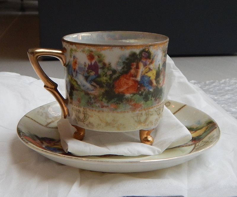 Resized Handpainted Cup and Saucer 1.jpg