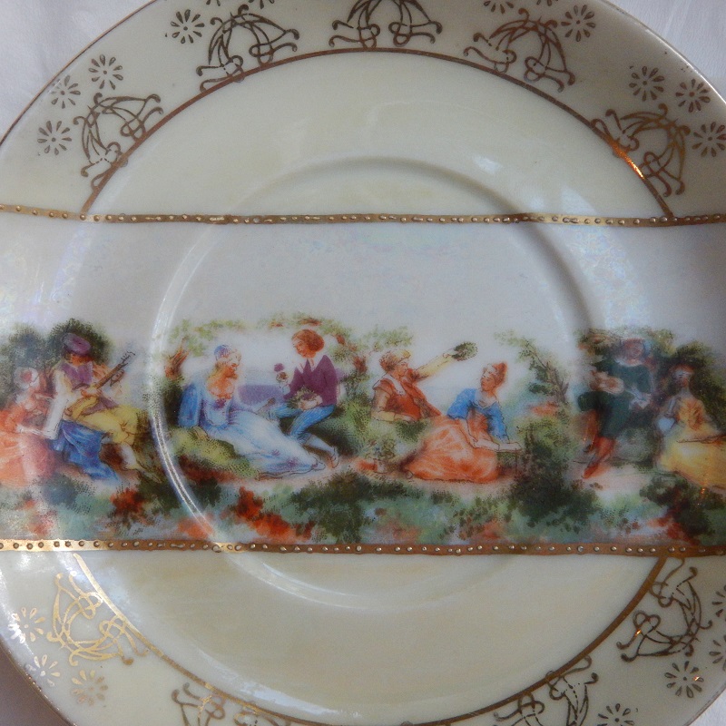 Resized Handpainted Saucer Front Close Up.jpg