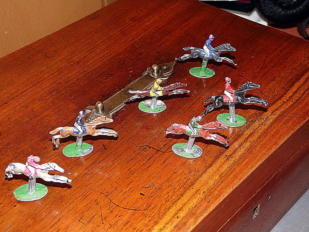 Mini metal toy figurines Antiques Board
