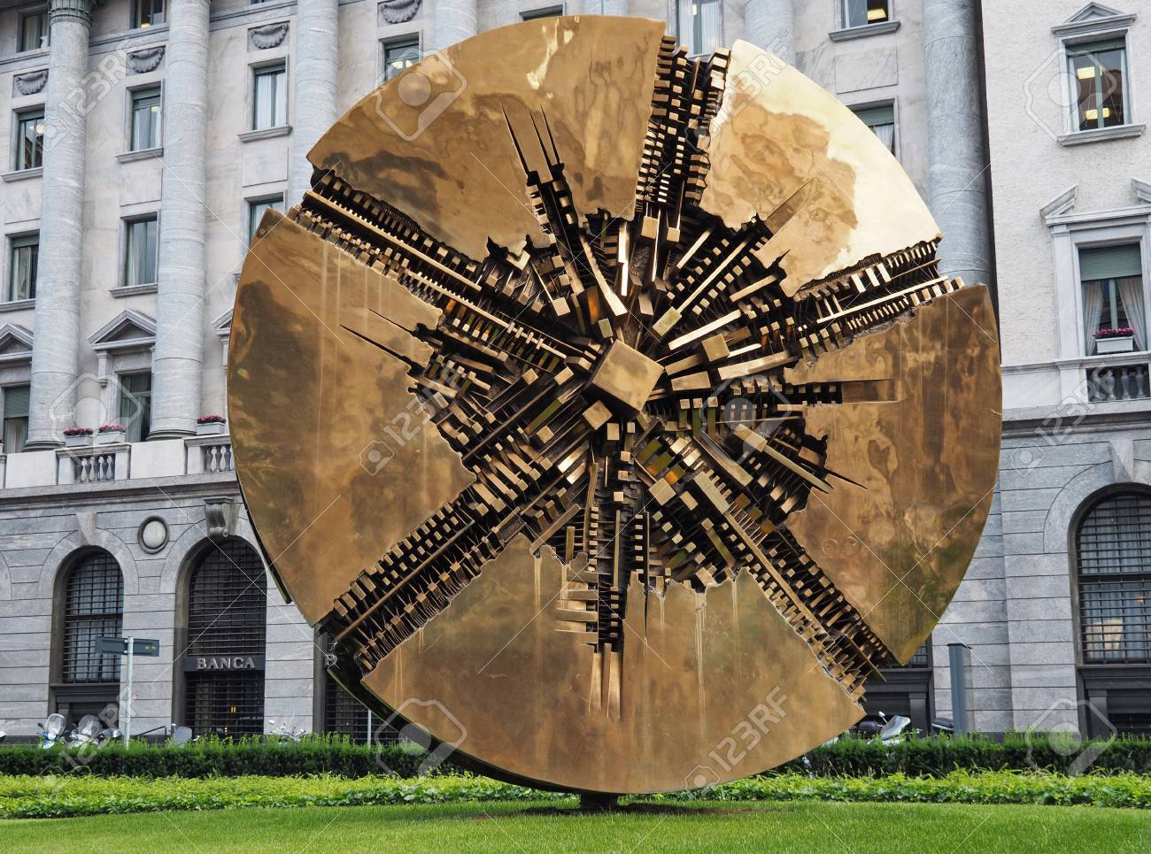 sculpture-of-arnaldo-pomodoro-in-meda-square-milan-lombardy-italy.jpg