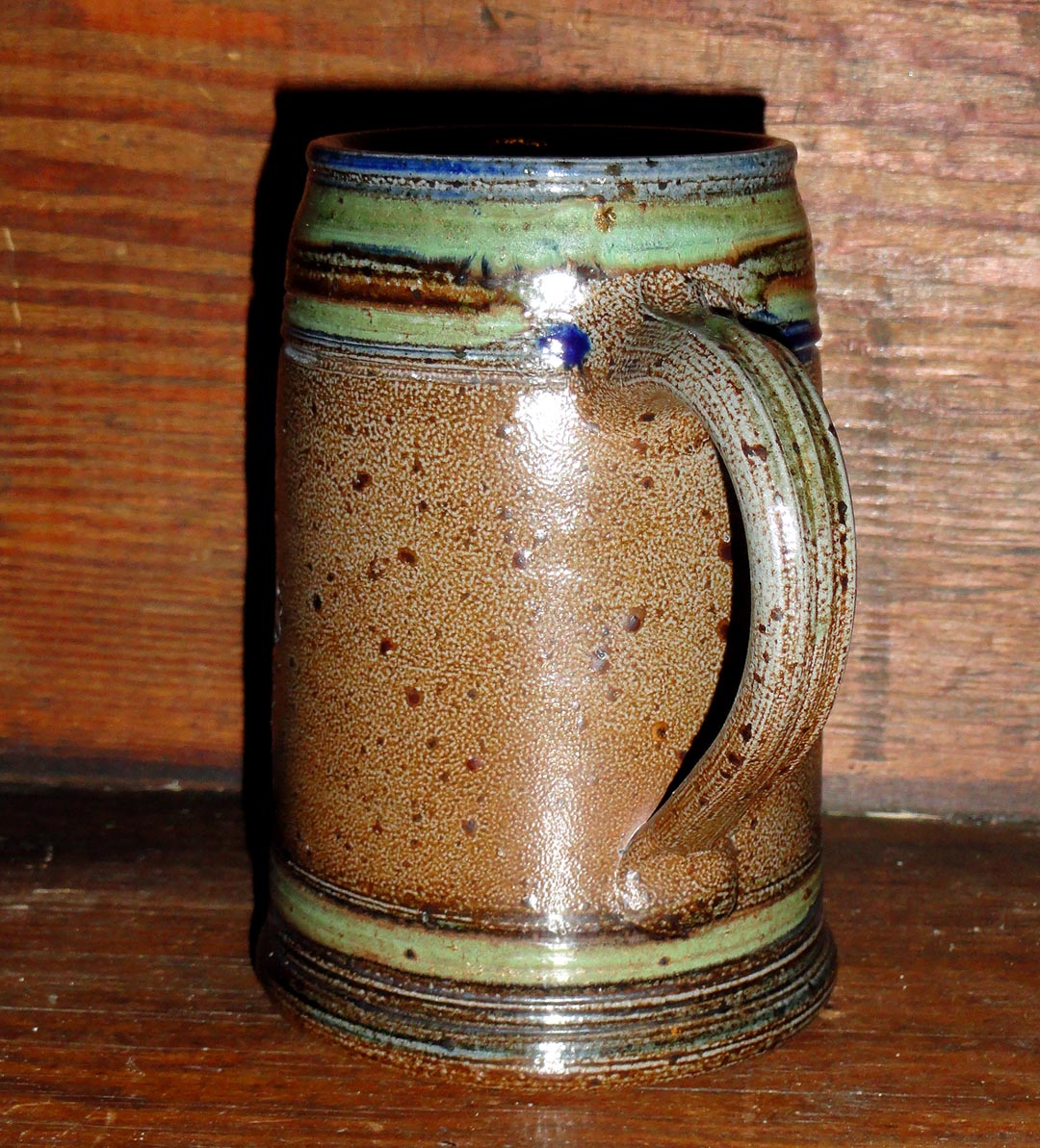 Stoneware stein with handwritten mark, can't read Antiques Board