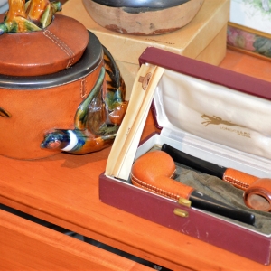 Longchamp leather covered pipes