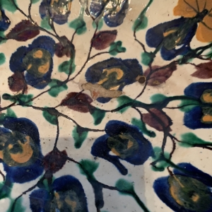 Blue and green underglaze painted ochre overglaze