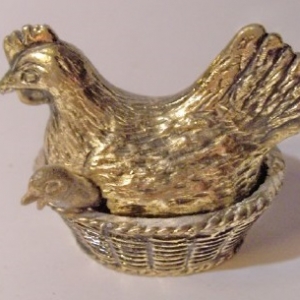 metallic hen on nest salt server (chick is spoon)