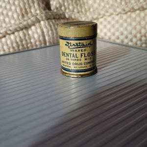 Antique Advertising Tin with original wood spool