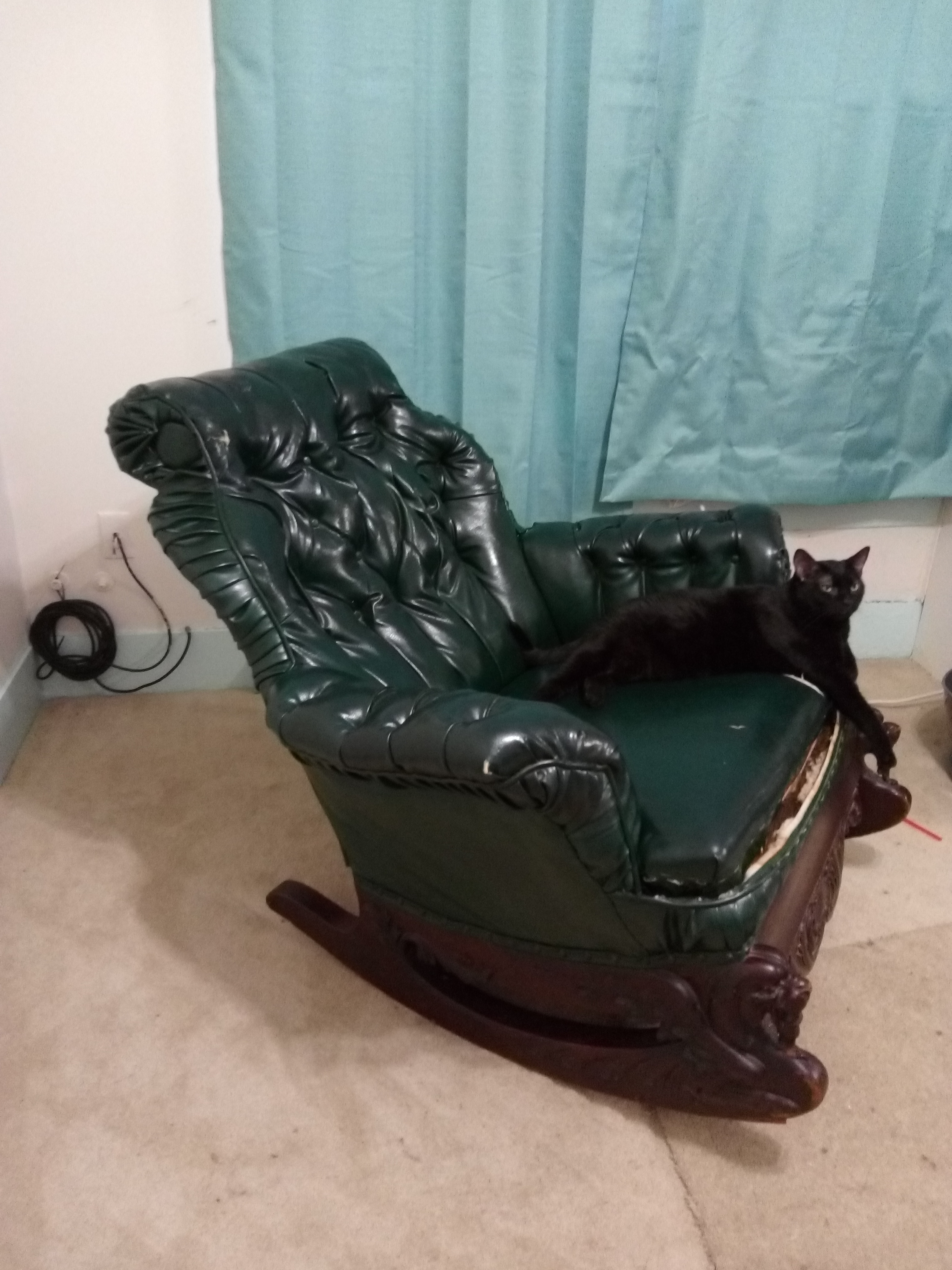 1800s rocker, horse hair stuffed?