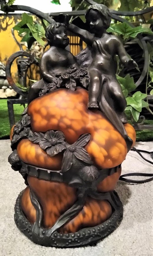 Amber Cherub Lamp.. DK much about this one