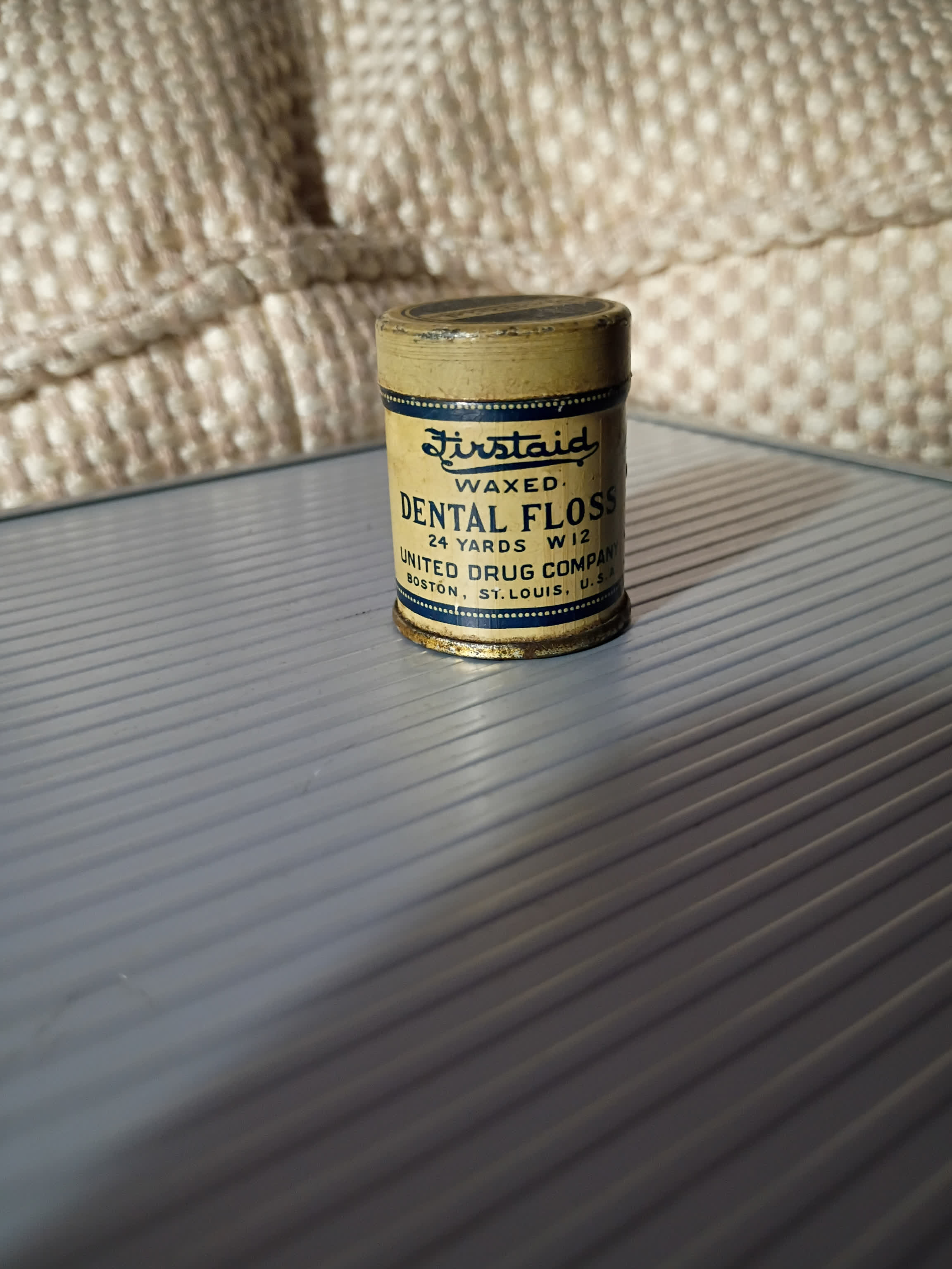 Antique Advertising Tin with original wood spool