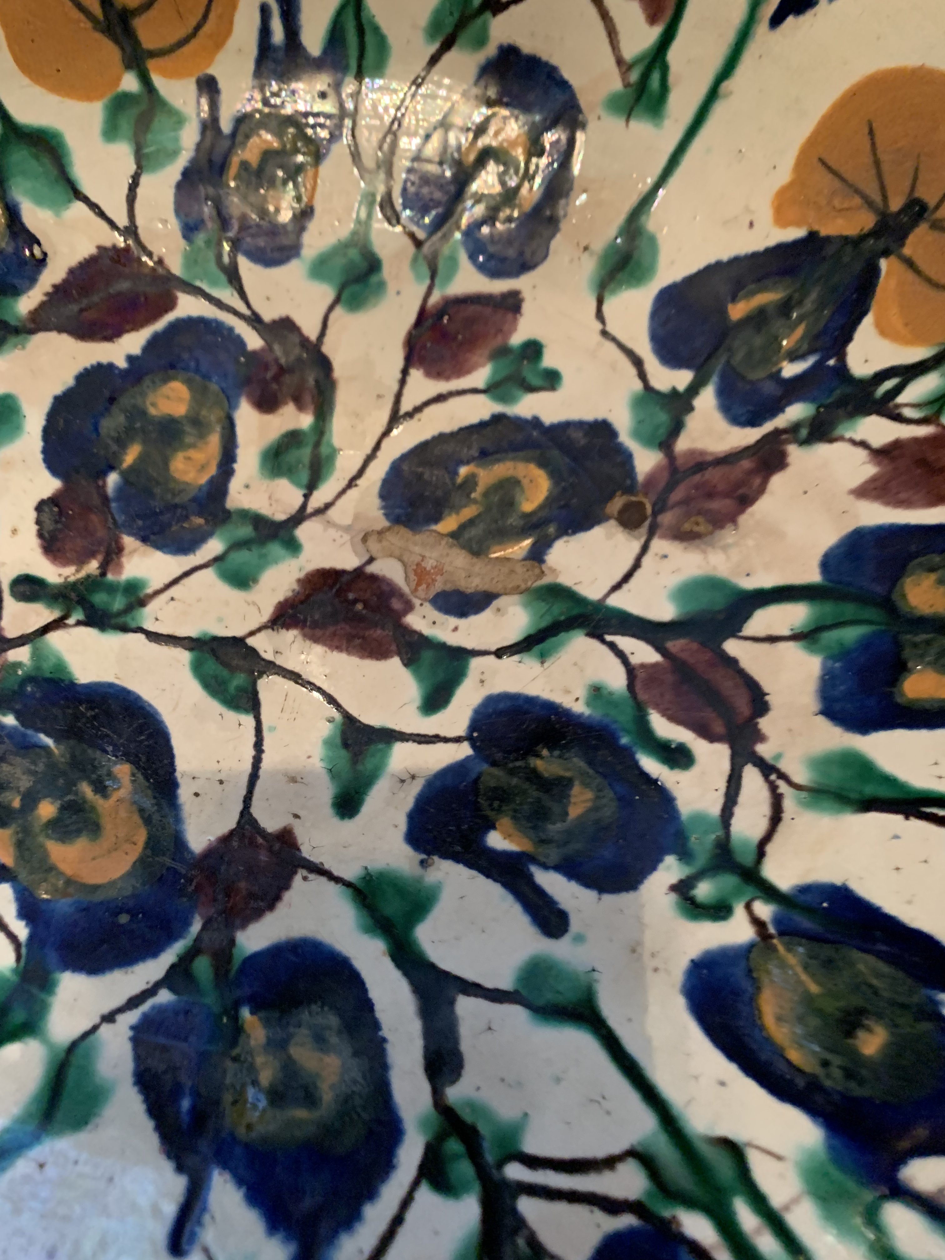 Blue and green underglaze painted ochre overglaze