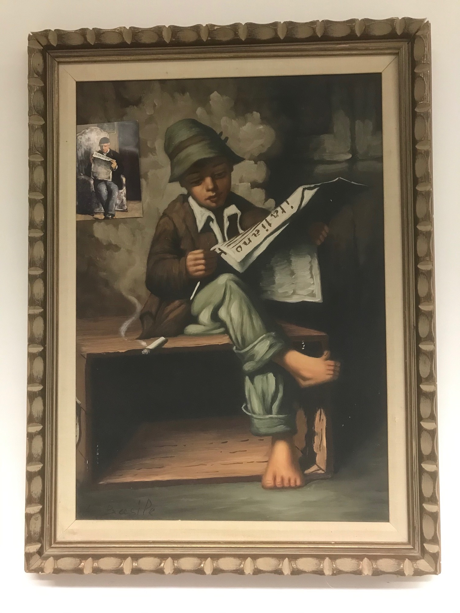 Boy reading newspaper