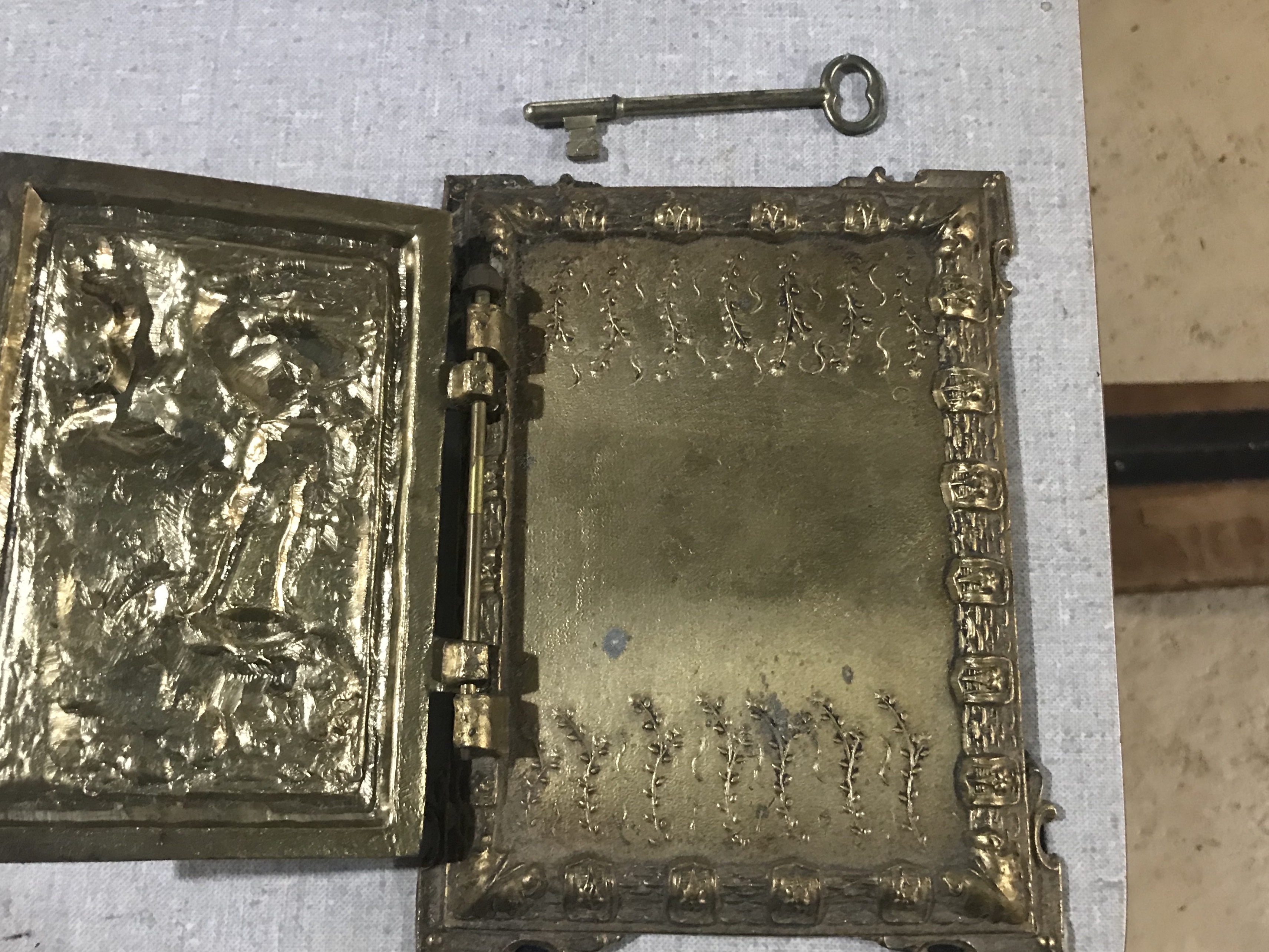 Brass album, plaque, ?