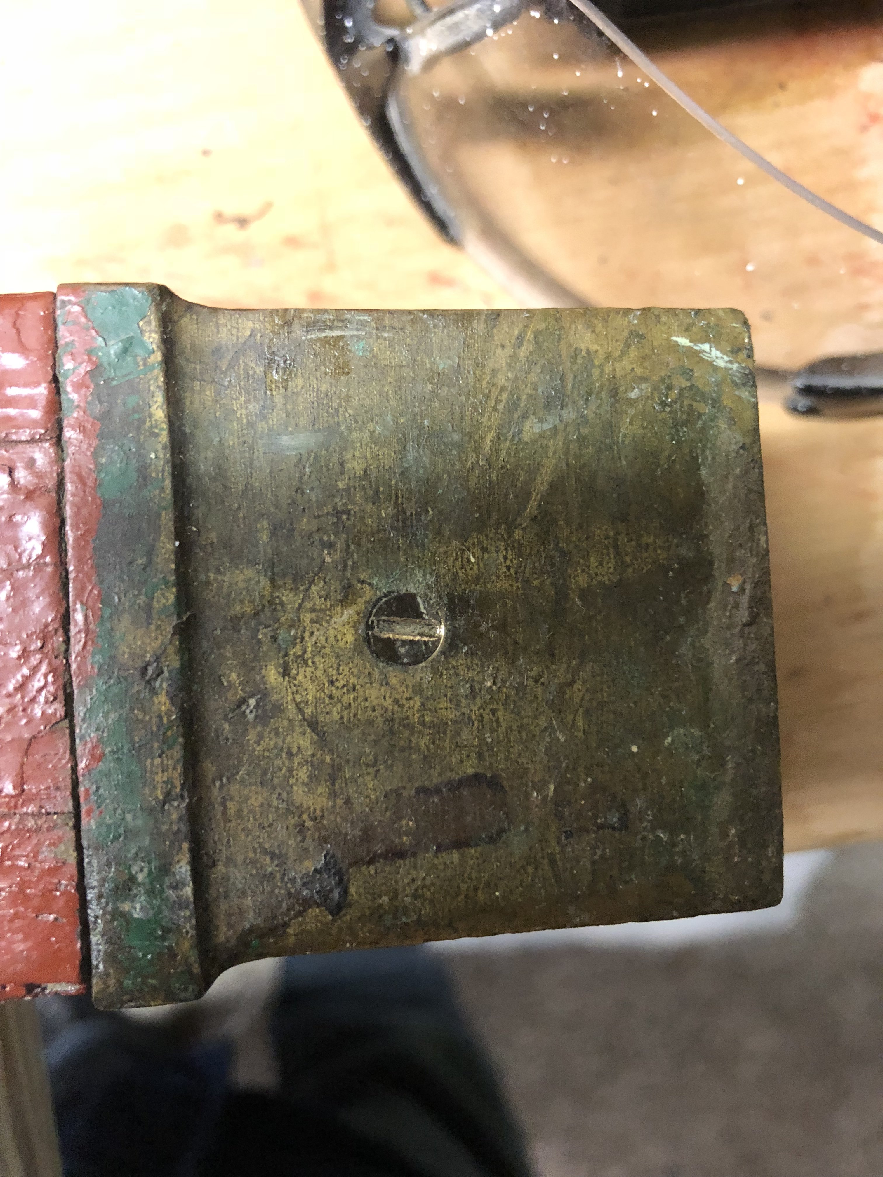 Bronze cap on bottom of legs