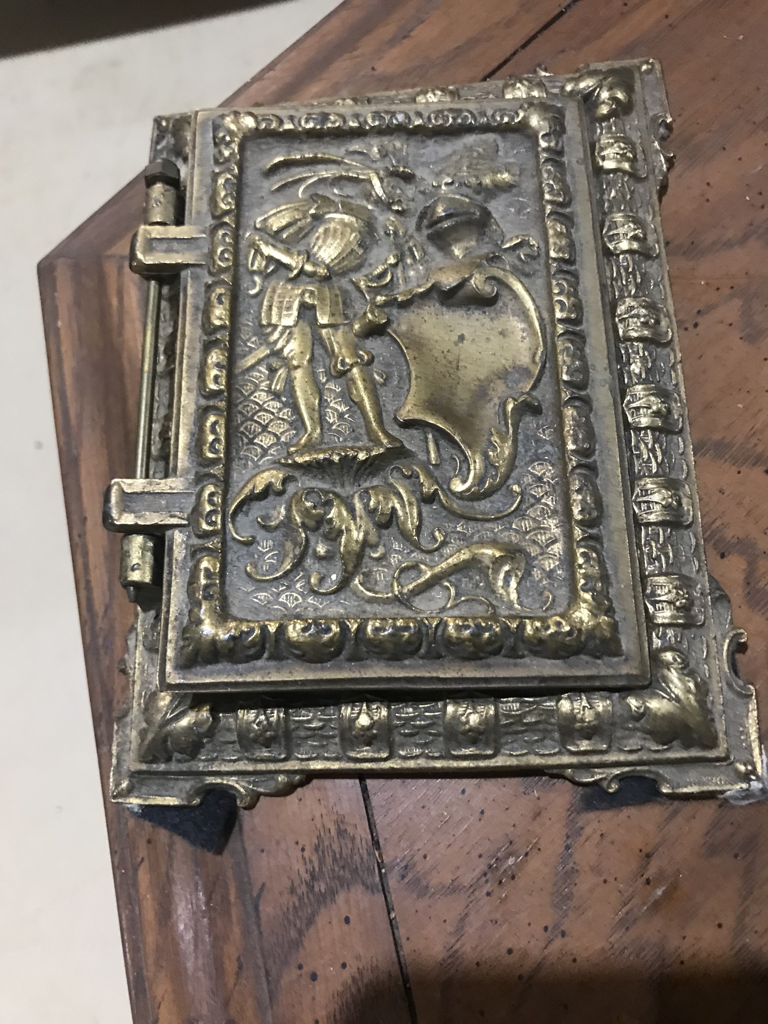 Old brass, album, lid, plaque.....?