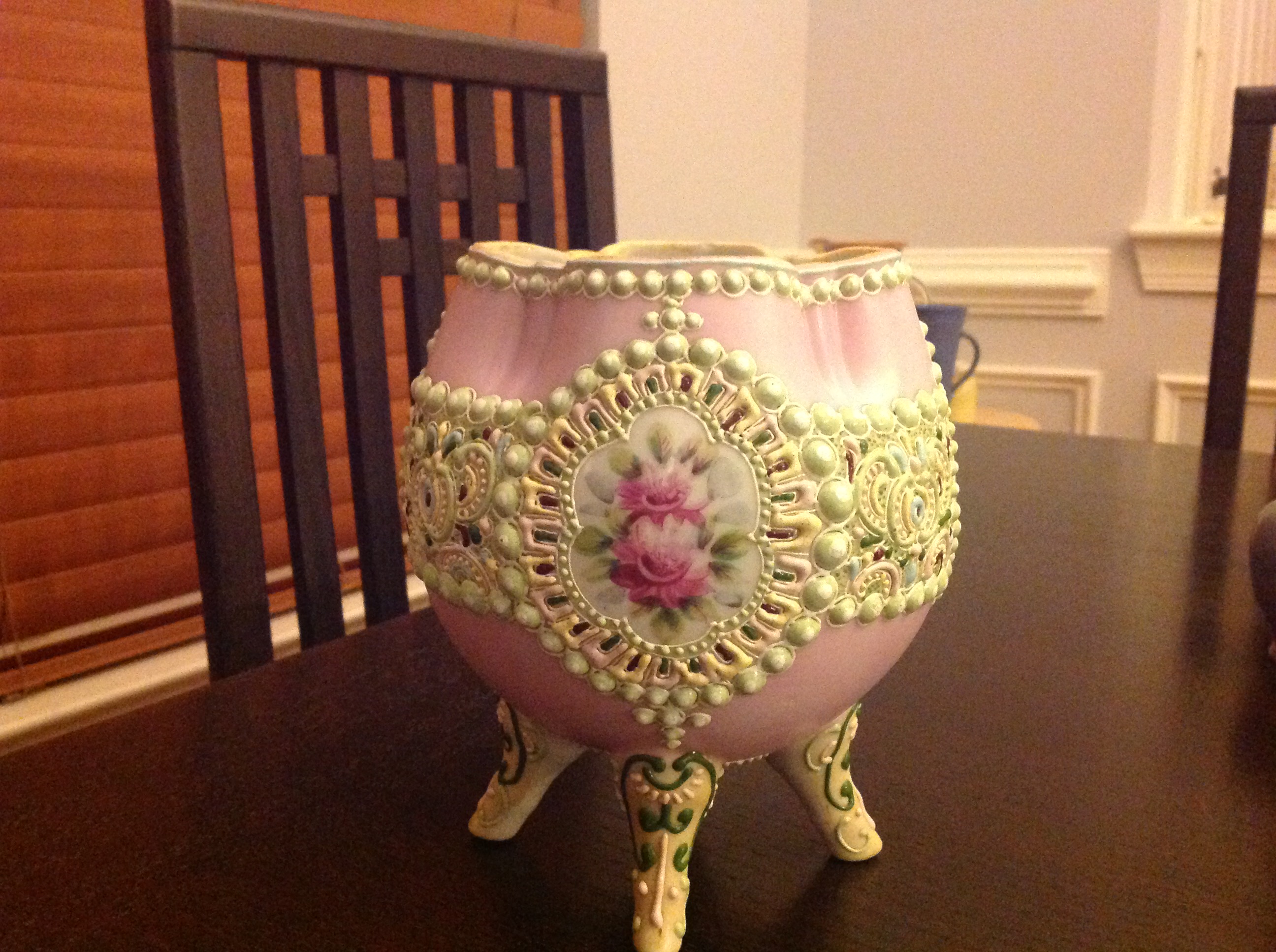 Pink porcelain vase with raised ornamentation