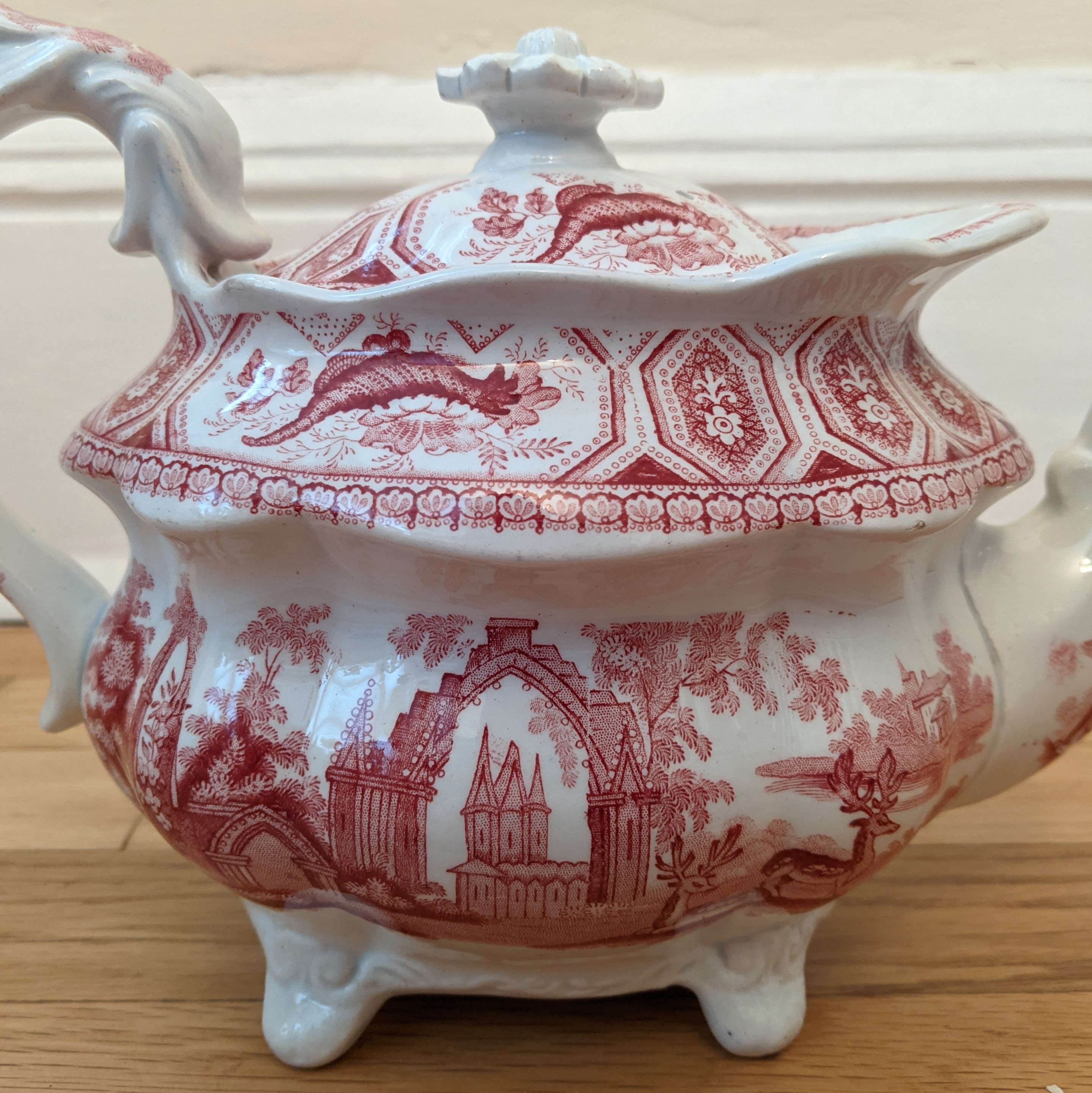 Red transferware teapot