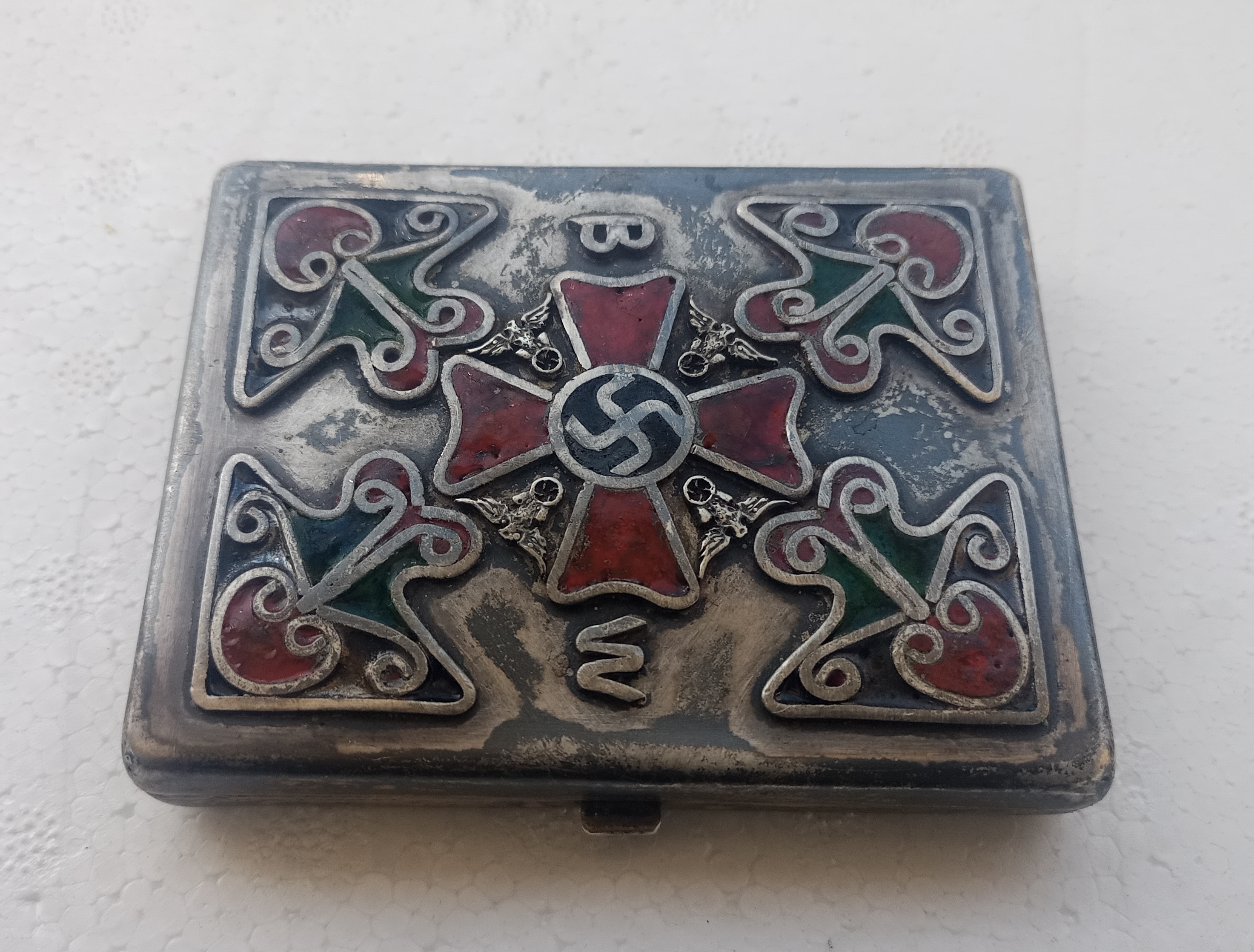 What is the value of silver with enamel sigarette box?