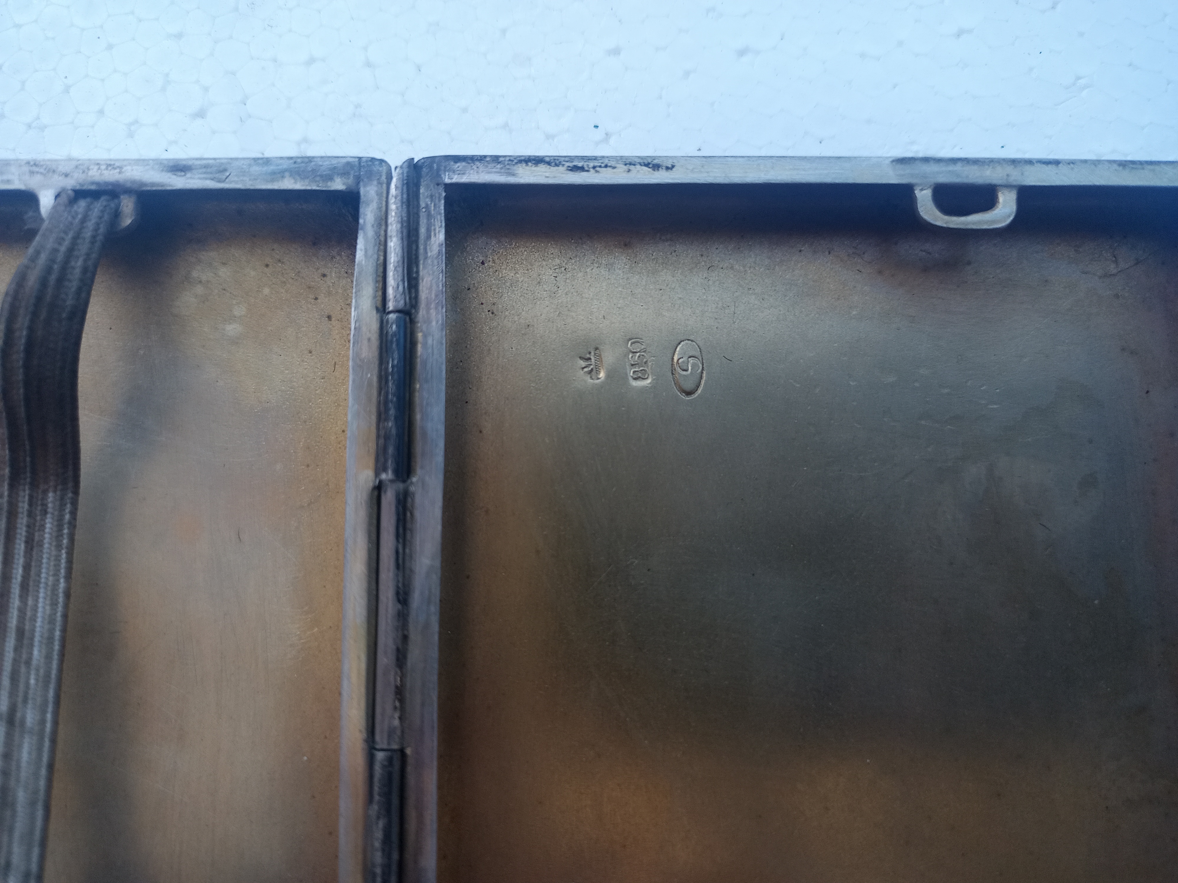 What is the value of silver with enamel sigarette box?